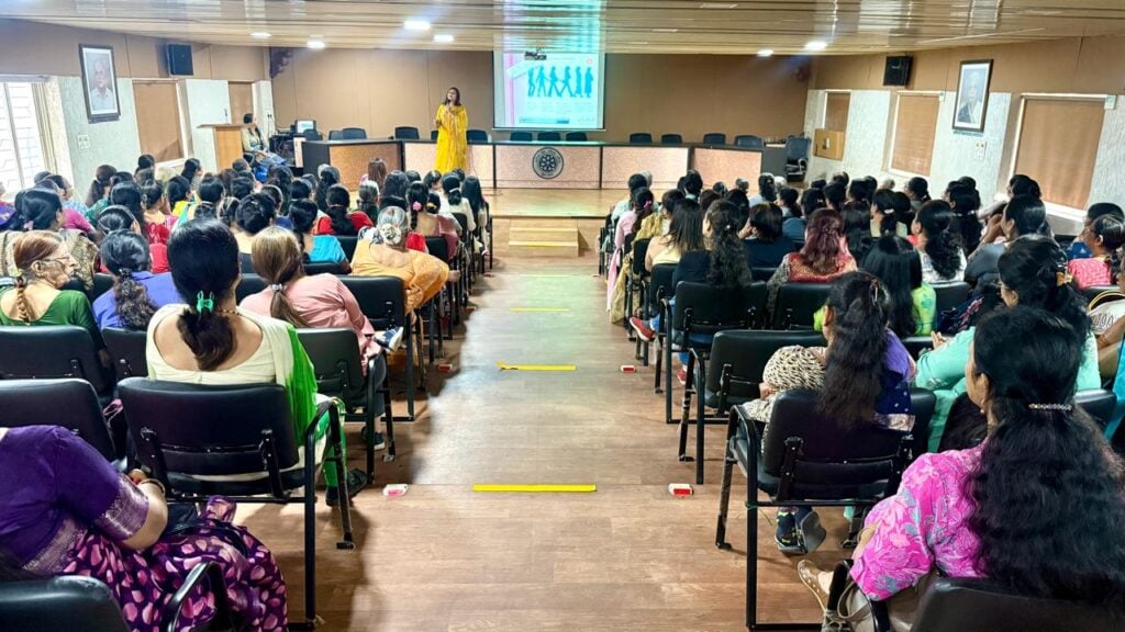 Dr. Rupal Shah presenting at the Akhil Hind Mahila Parishad
